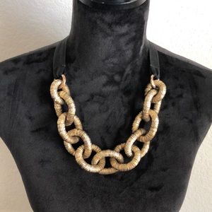 Dusty gold chain necklace.